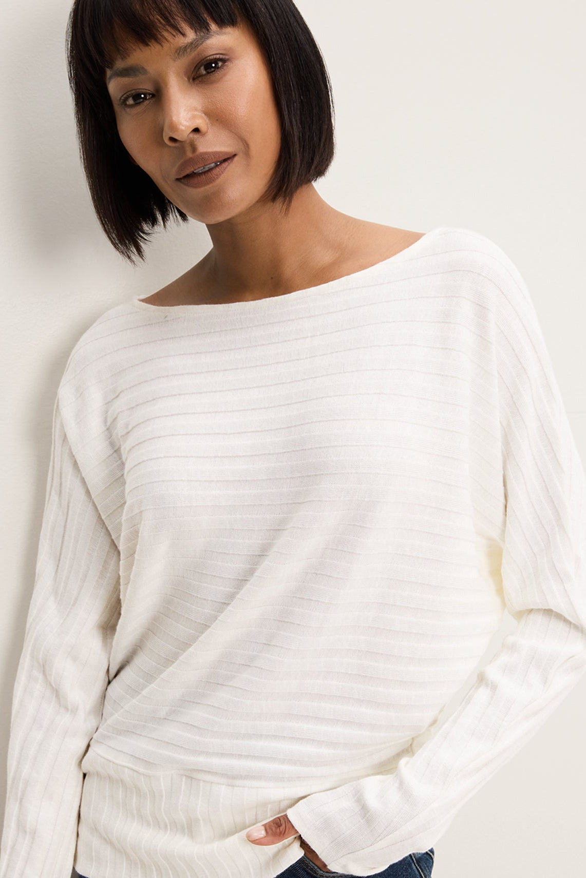 Woman wearing Fleur Boatneck Dolman Sleeve Top in Coconut Milk