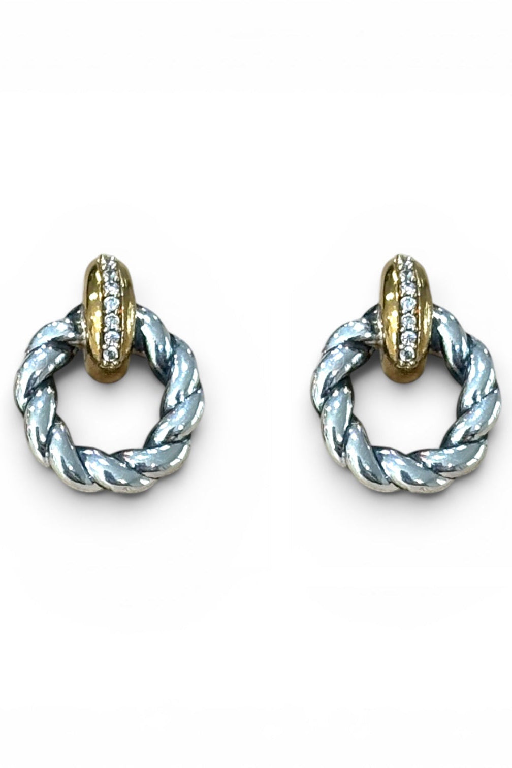 A pair of 2tone veda twist silver and gold hoop earrings with a twisted rope design and a small row of clear stones on the gold top, shown on a plain white background.