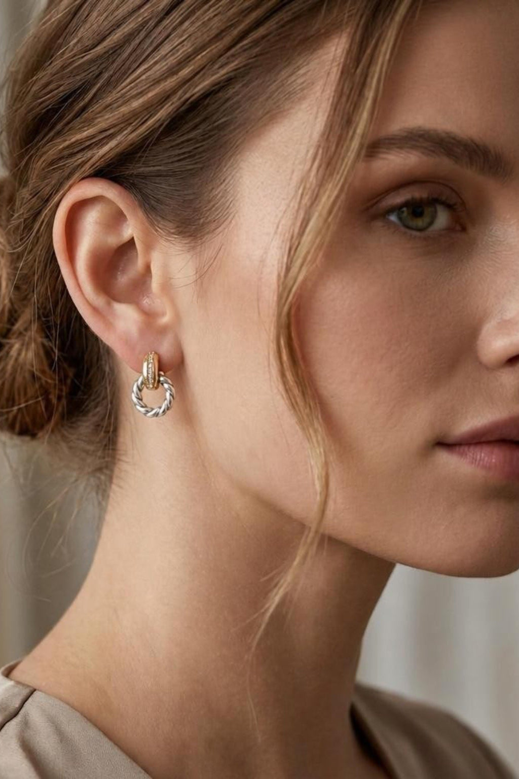 Woman wearing 2Tone Veda Twist Earrings