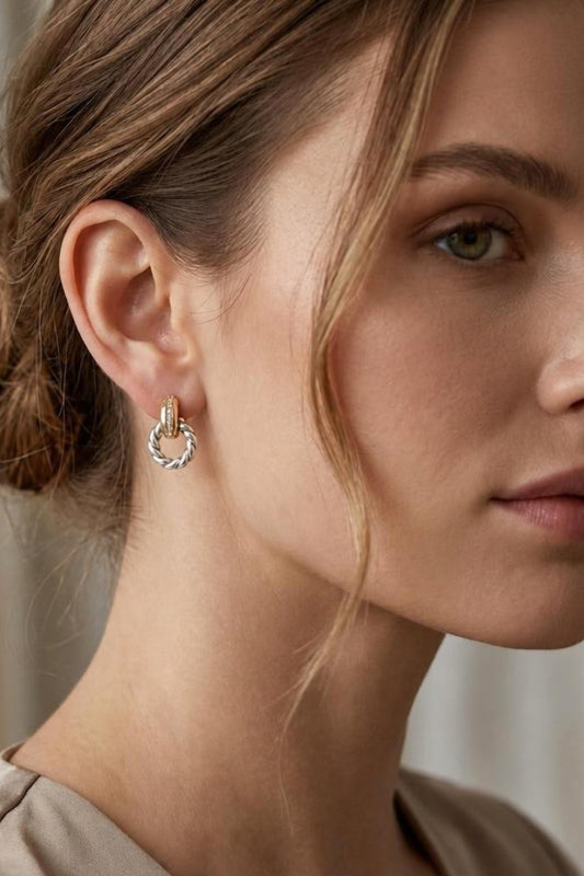 Woman wearing 2Tone Veda Twist Earrings