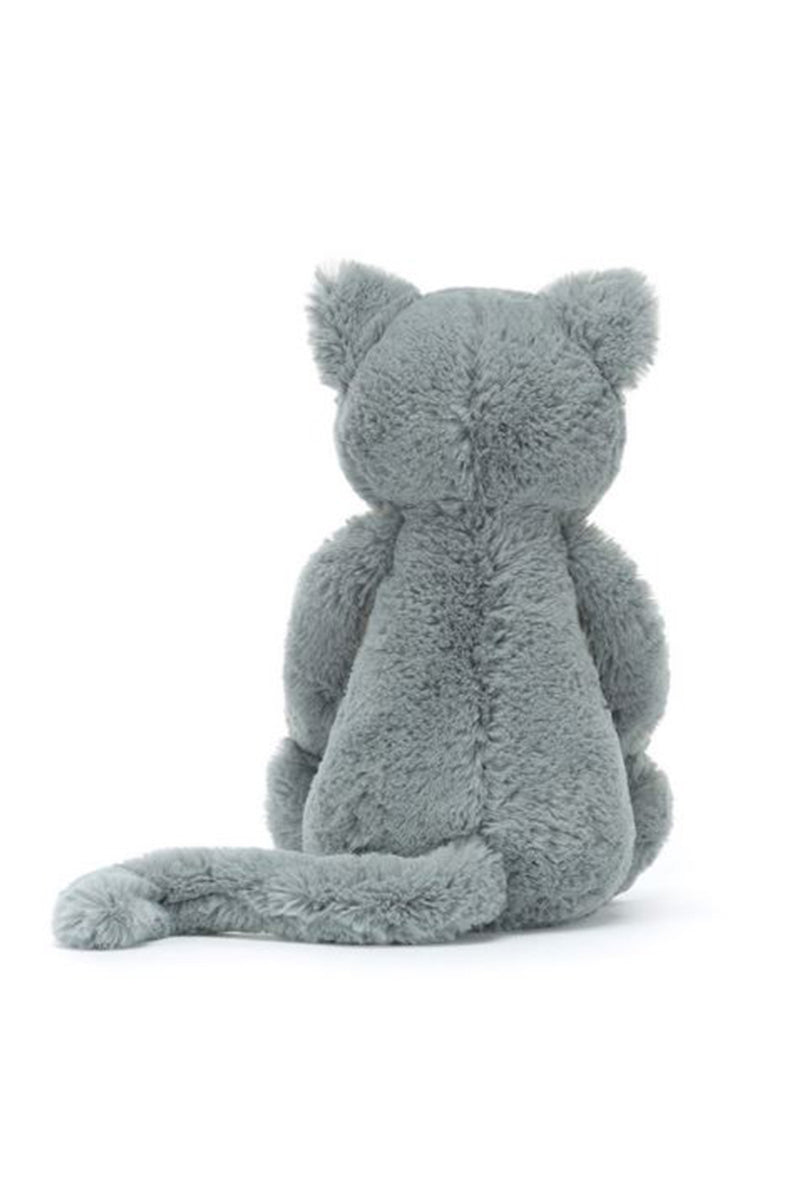 Grey medium stuffed kitten, curled sitting position with upright ears