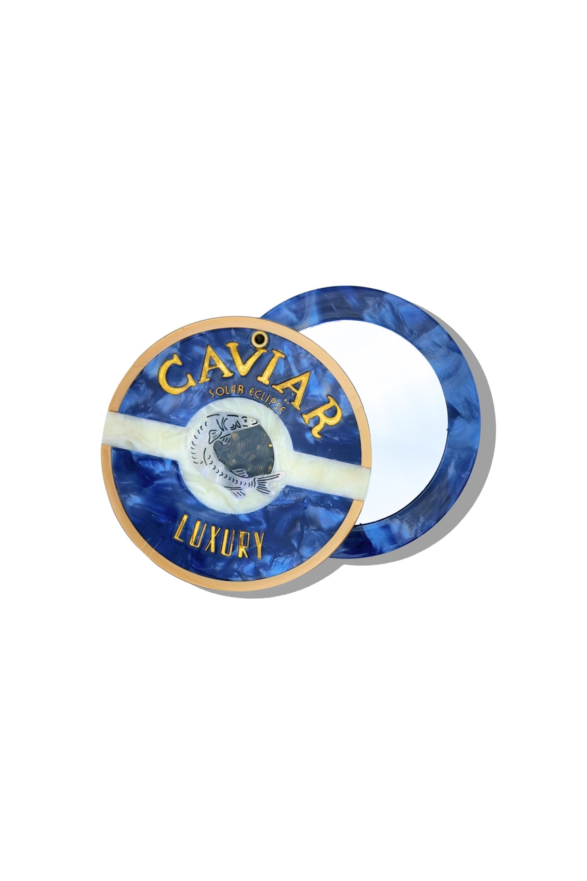 Round compact mirror with blue marbled frame and “CAVIAR LUXURY” artwork