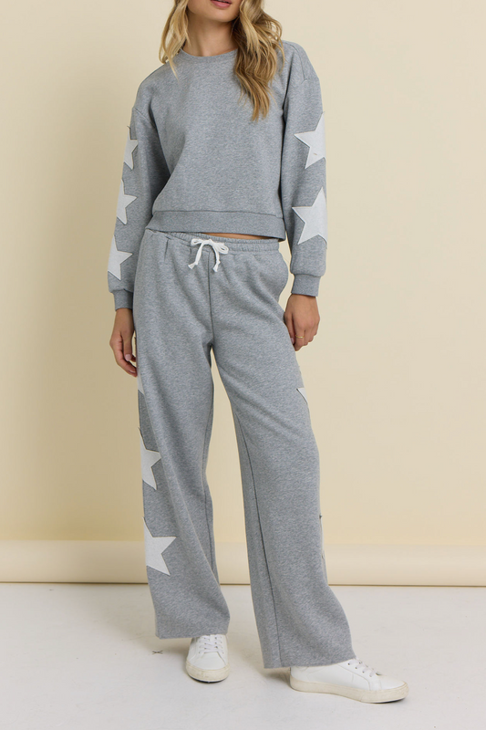 Moon grey terry wide-leg pants with white star print and drawstring waist