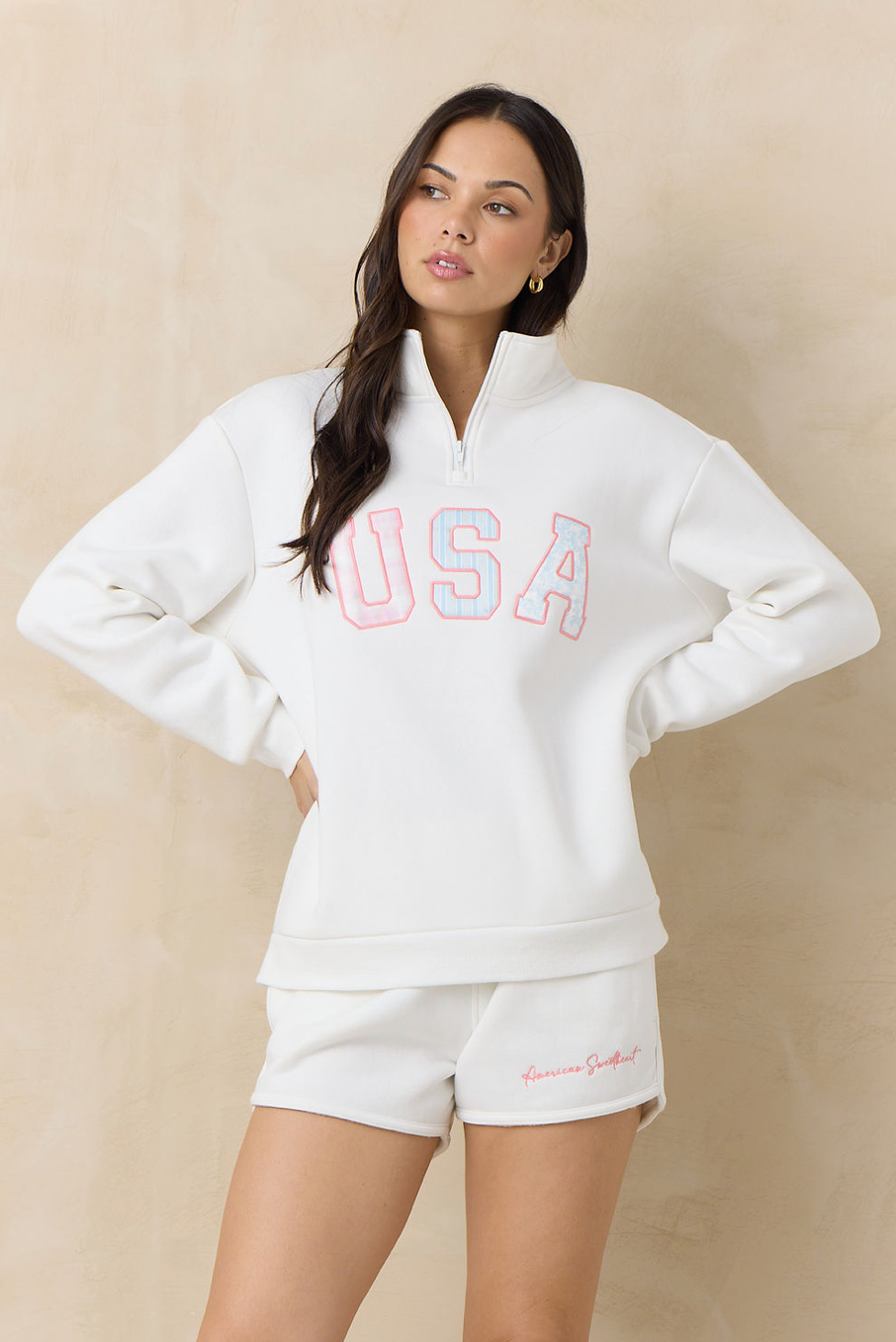 White fleece quarter-zip sweatshirt with red USA logo