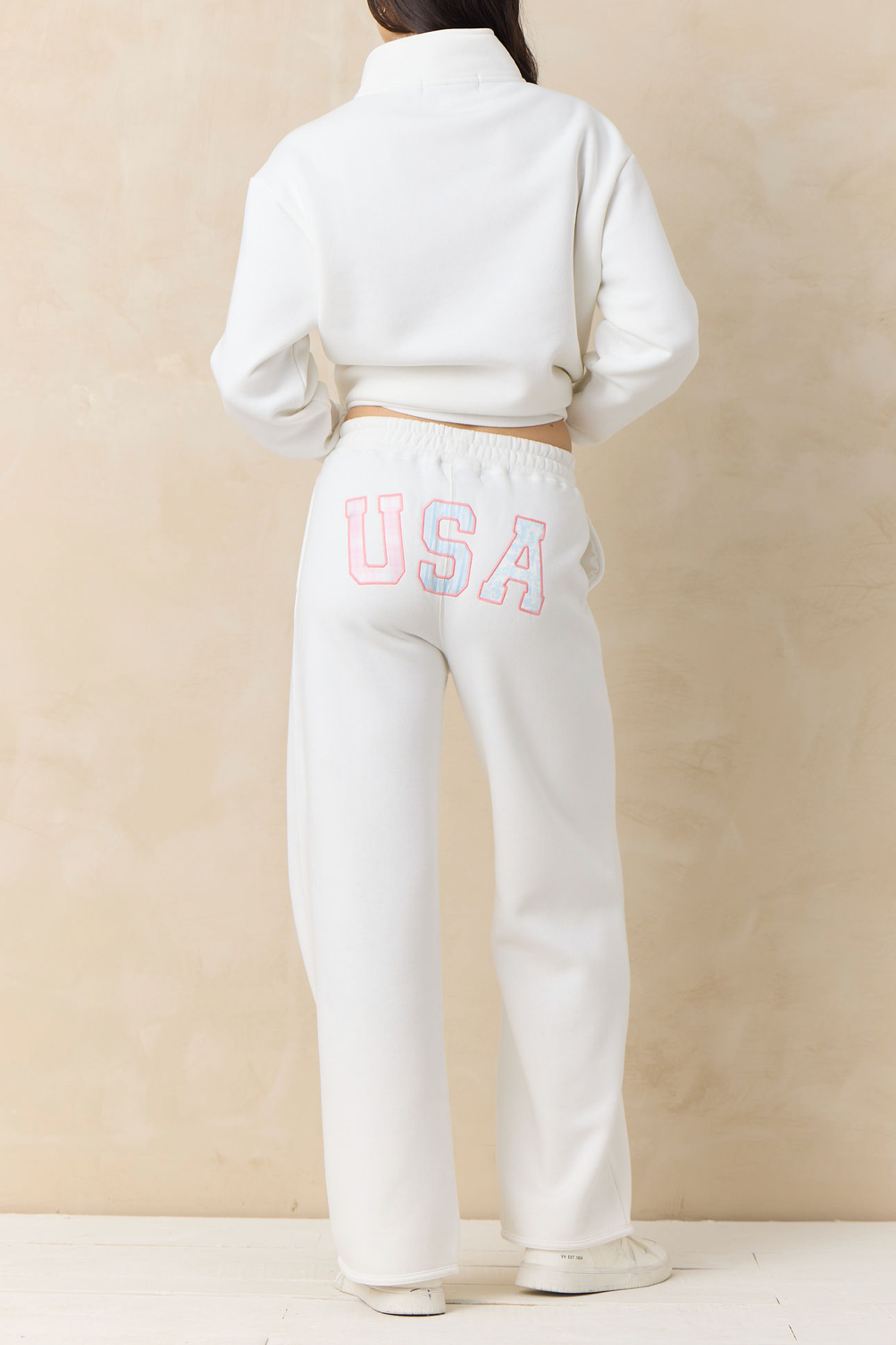 White fleece wide-leg pants with USA graphic on back waist