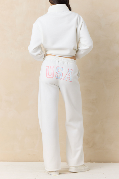 White fleece wide-leg pants with USA graphic on back waist
