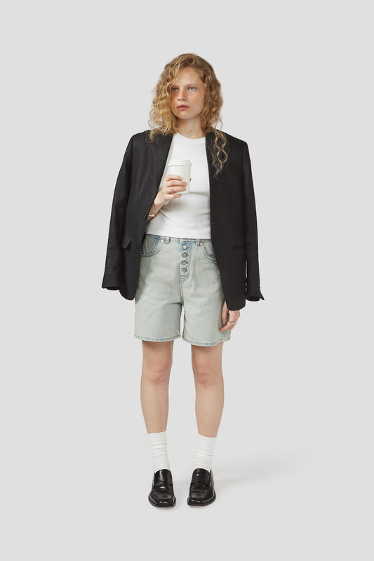 Light-wash denim shorts with belt loops, button fly, and front pockets