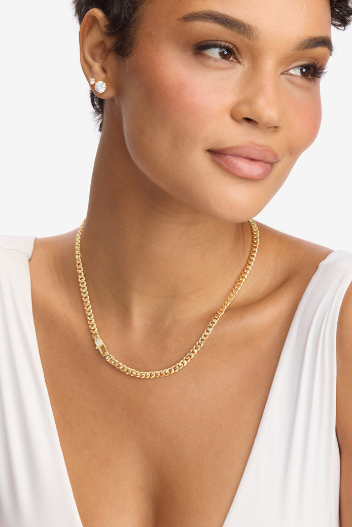 Gold-tone chain necklace with pavé lock pendant and round crystal accents