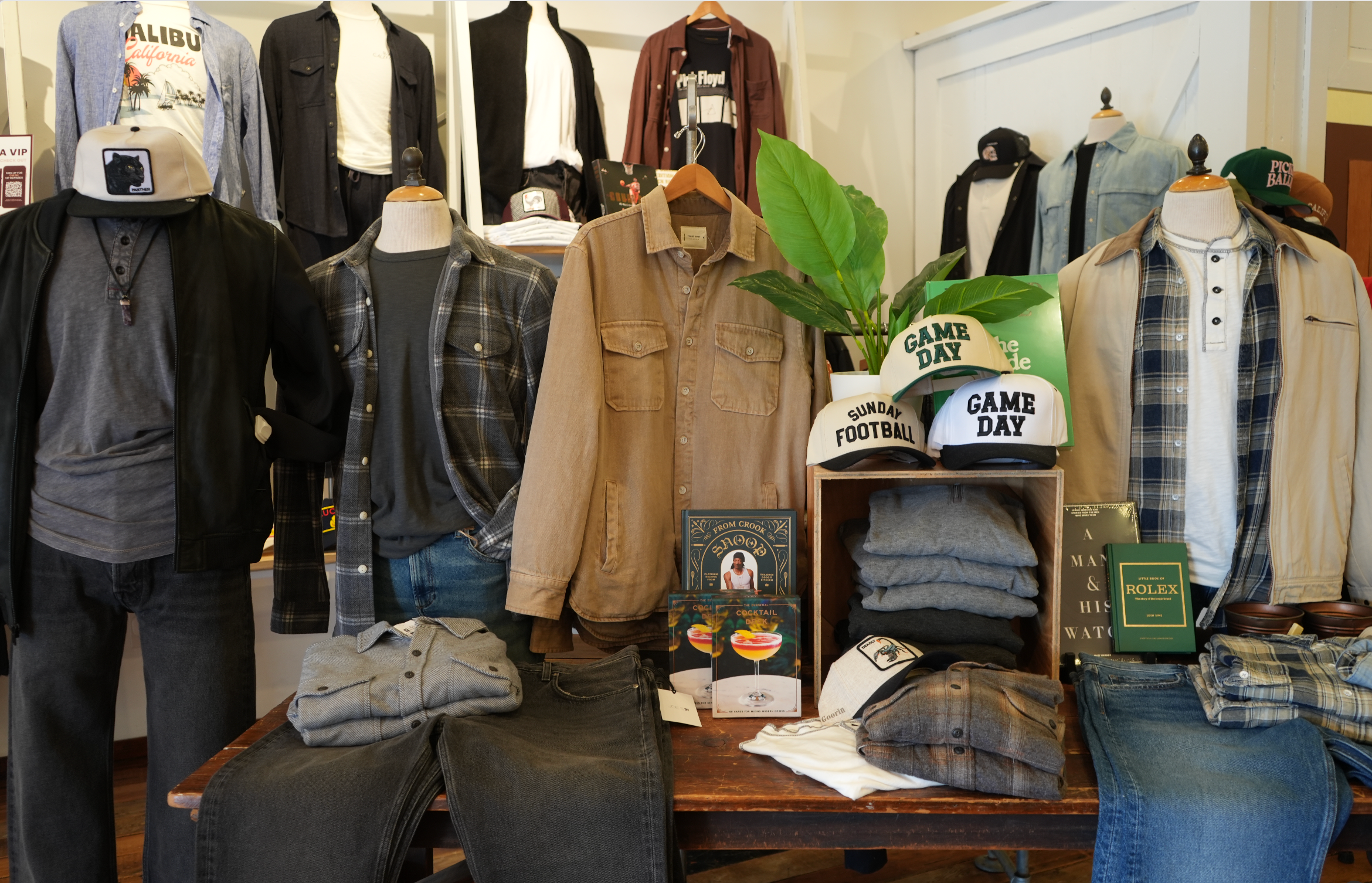 Display of men's clothing and accessories in a store setting