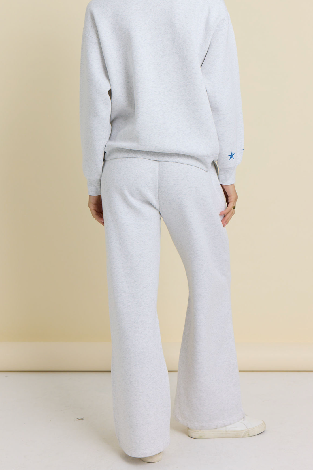Ash grey wide-leg pants with star embroidery on leg, elastic waistband and hem